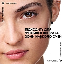 Сонцезахисний невагомий флюїд проти ознак фотостаріння шкіри обличчя, SPF 50+ - Vichy Capital Soleil UV-Age Daily — фото N14