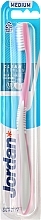 Парфумерія, косметика Зубна щітка для чутливих зубів та ясен, середньої жорсткості, пудрова - Jordan Clean Between