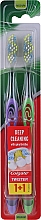 Духи, Парфюмерия, косметика Зубная щетка "Twister", средняя, салатовая + фиолетовая - Colgate Twister Medium