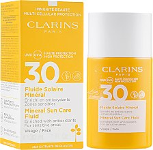 Духи, Парфюмерия, косметика Солнцезащитный флюид для лица - Clarins Fluide Solaire Mineral Visage SPF 30