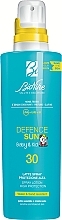 Парфумерія, косметика Дитячий сонцезахисний спрей-лосьйон для тіла - BioNike Defence Sun Baby&Kid SPF30 Spray Lotion