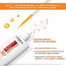 Флюид с витамином С для защиты лица SPF 50+ - L'Oreal Paris Revitalift Clinical SPF50+ Anti-UV Fluid — фото N6