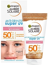 Сонцезахисний крем для обличчя - Garnier Ambre Solaire Anti-Dryness Super UV Protection Cream With Glycerin SPF50 — фото N1