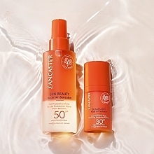 Сонцезахисний флюїд для обличчя - Lancaster Sun Beauty Nude Skin Sensation Sun Protective Fluid SPF30 — фото N8