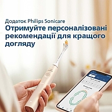 Электрическая звуковая зубная щетка с технологией SenseIQ, бежевая - Philips Sonicare 9900 Prestige HX9992/11 — фото N5