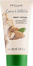 Духи, Парфюмерия, косметика Лосьон для тела "Миндаль" - Oriflame Love Nature Body Lotion (мини)