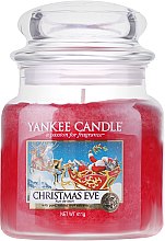 Ароматическая свеча "Канун Рождества" в банке - Yankee Candle Christmas Eve — фото N1