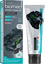Парфумерія, косметика Антибактеріальна відбілююча зубна паста "Вугілля" - Biomed White Complex