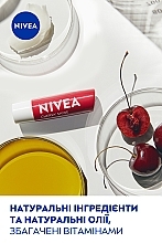 Бальзам-уход для губ "Вишневое сияние" - NIVEA Cherry Shine — фото N5