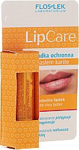 Духи, Парфюмерия, косметика Защитная помада с маслом ши - Floslek Lip Care Protective Lipstick With Shea Butter