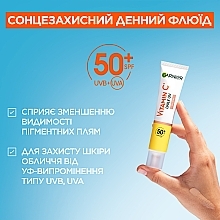 Дневной солнцезащитный флюид с витамином C для придания сияния коже лица, SPF50+ - Garnier Skin Naturals — фото N10