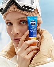 Сонцезахисний крем для обличчя SPF50 - NIVEA Sun Alpin Sun Cream for Face SPF 50+ — фото N6