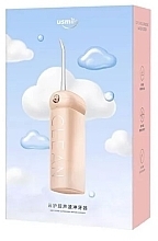 Іригатор для ротової порожнини, рожевий - Usmile Cordless Ultrasonic Water Flosser Pink — фото N2