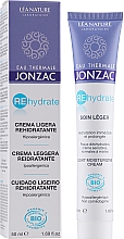 Легкий зволожувальний крем для обличчя - Eau Thermale Jonzac Rehydrate Light Moisturizing Cream — фото N2