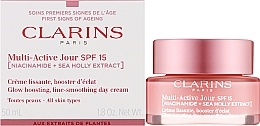 Дневной солнцезащитный крем для лица - Clarins Multi-Active Jour SPF15 Niacinamide+Sea Holly Extract Glow Boosting Line-Smoothing Day Cream — фото N2